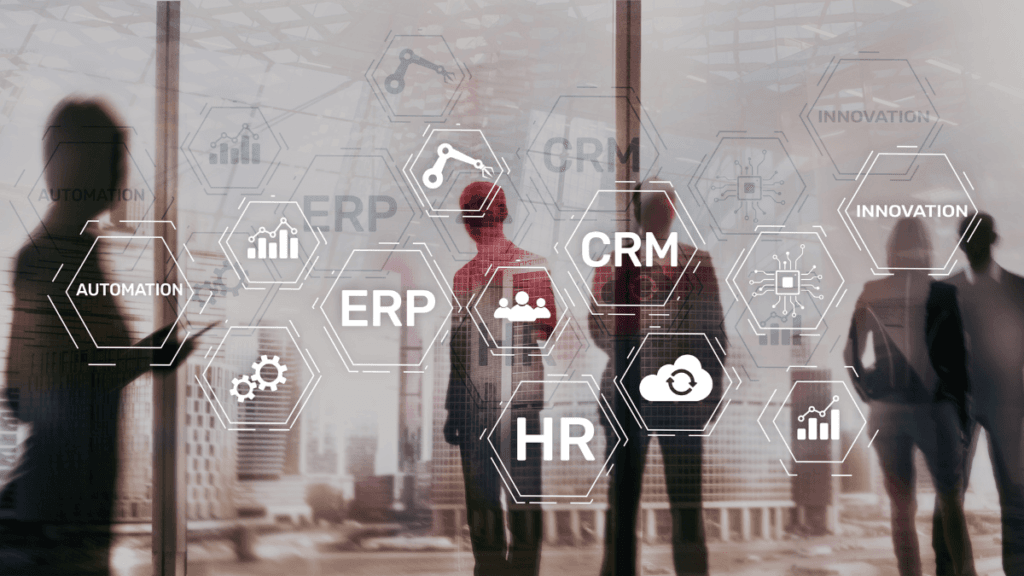 A background image of a skyline with people. In the foreground, is white text in hexagons saying 'ERP', 'HR' and 'CRM'.